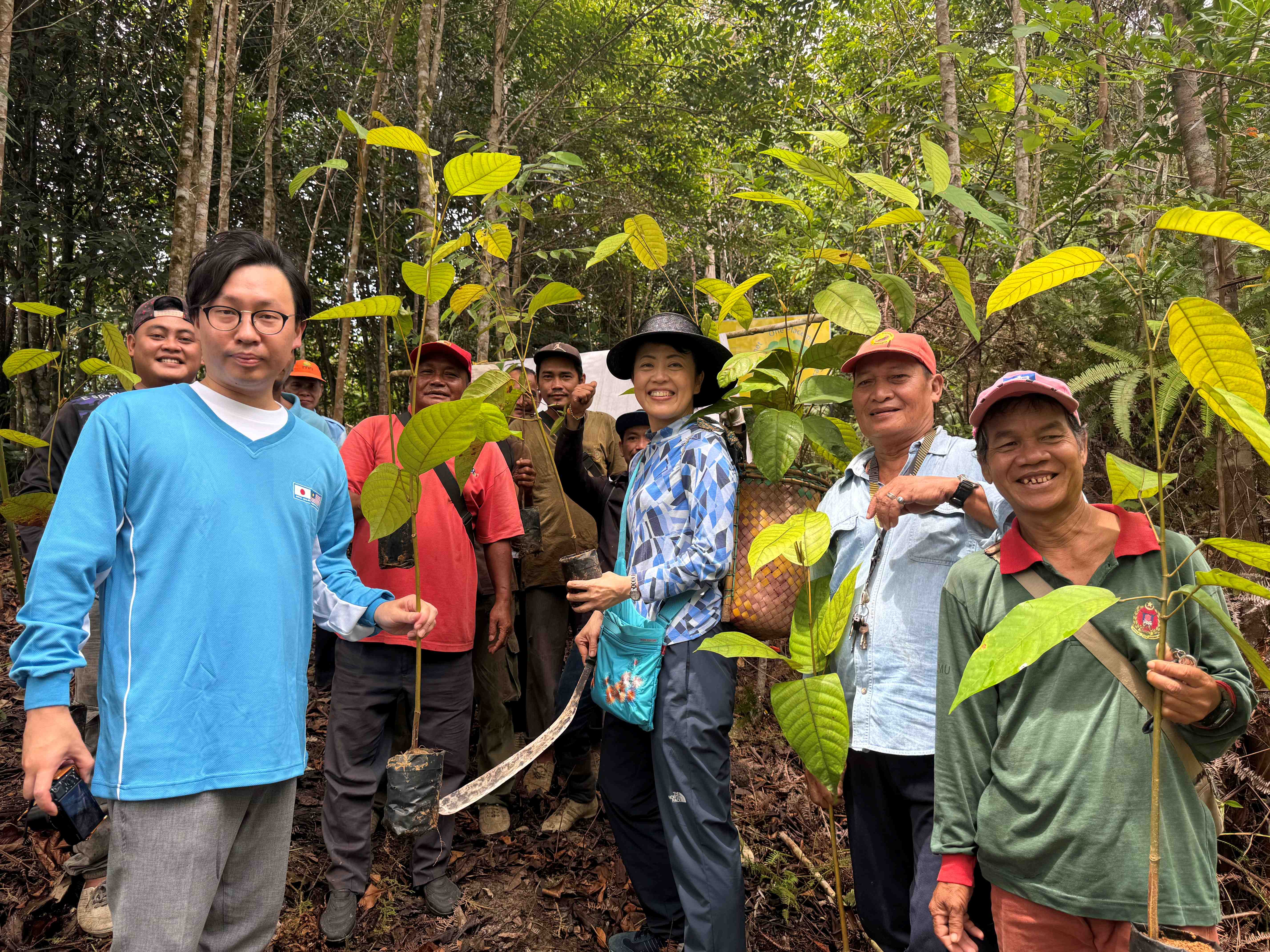 Vice-President Arimura and Secretary Watanabe at a tree-planting site in Sabal National Park
