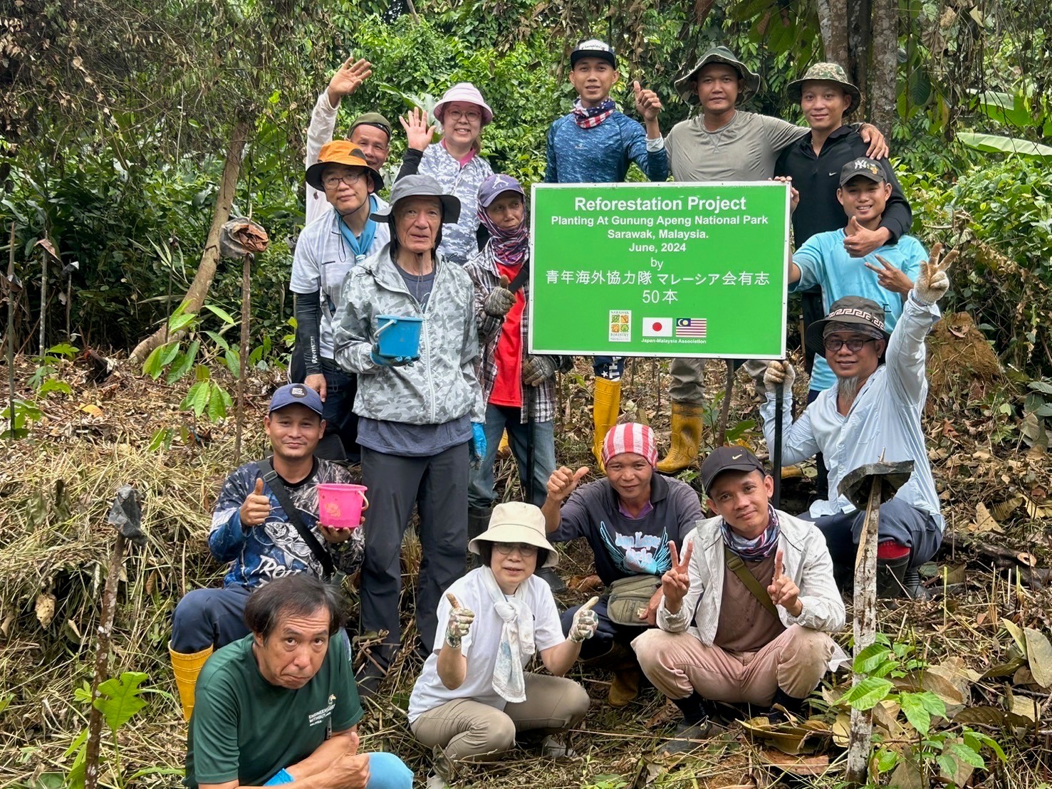 Group photo with local staff after tree-planting